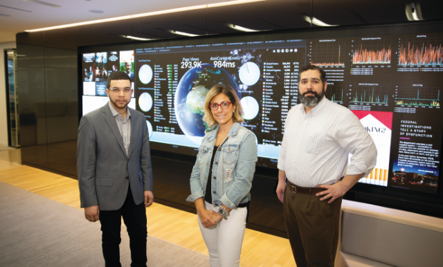 Travis Lyles '15 (left) with Anthony J. Rivera '03 and Anna Knapp '97 who also work at The Washington Post [Photo from 2019]